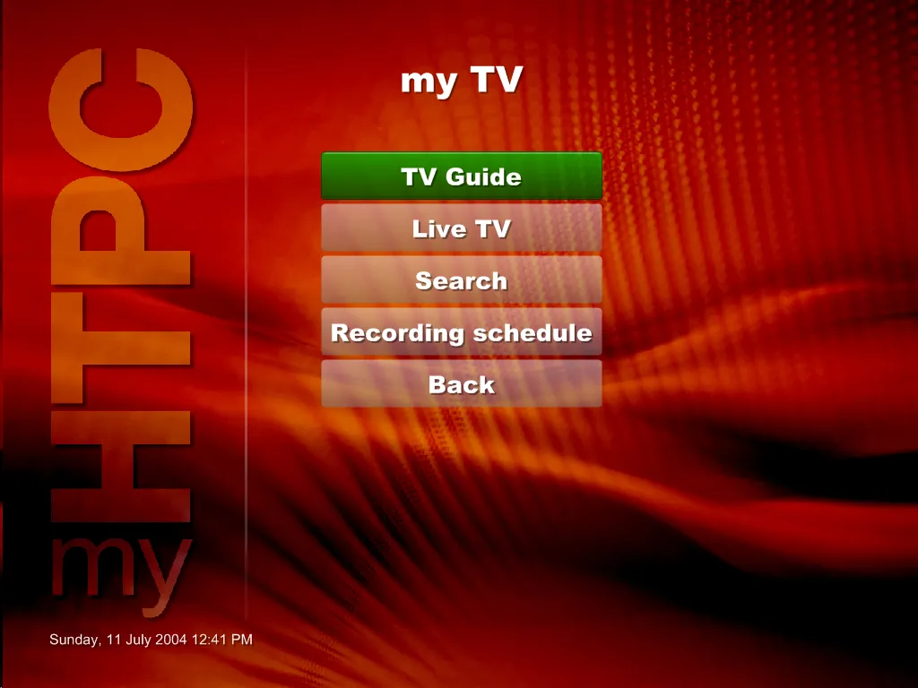 The myHTPC front end at 1024 by 768, on a deep red rippled background with a large translucent myHTPC wordmark down the left. The heading reads my TV, above five stacked buttons: TV Guide, highlighted in green, then Live TV, Search, Recording schedule and Back. A clock in the bottom left reads Sunday, 11 July 2004 12:41 PM